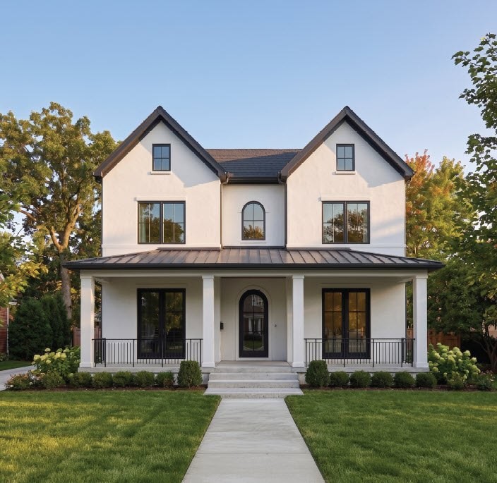 Rendering of the front exterior of 925 Greenleaf Avenue in Wilmette: white facade with twin gables, black-framed windows and a covered front porch