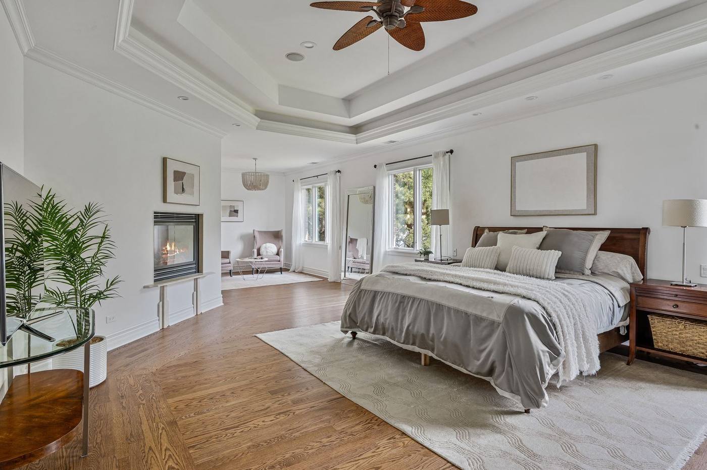 Primary bedroom with fireplace and sitting area